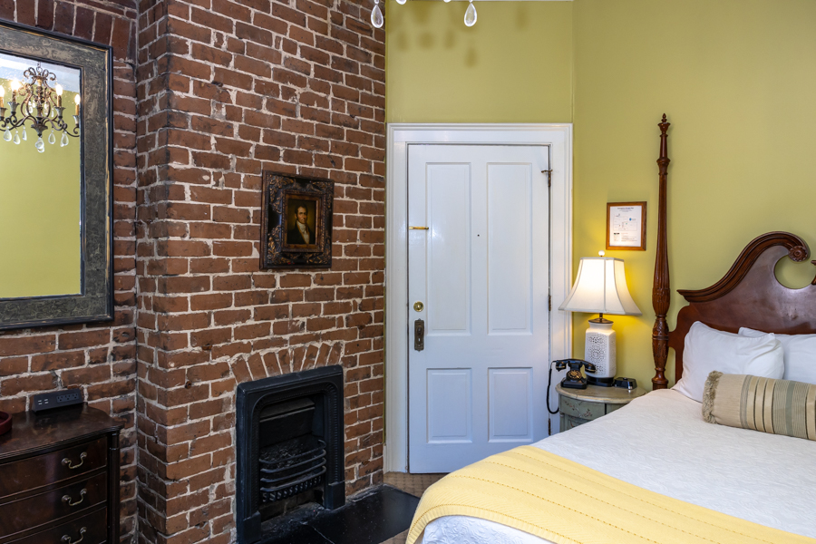 a brick fireplace in a room
